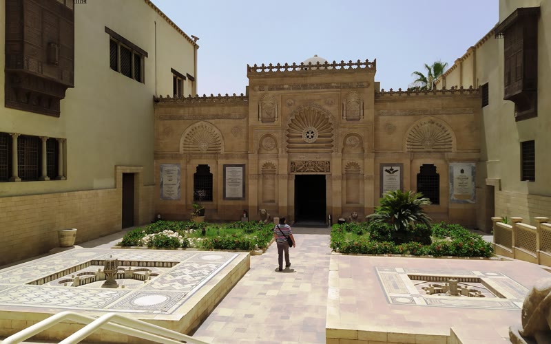 Ornamented entrance and stone courtyard of the Coptic Museum in Old Cairo
