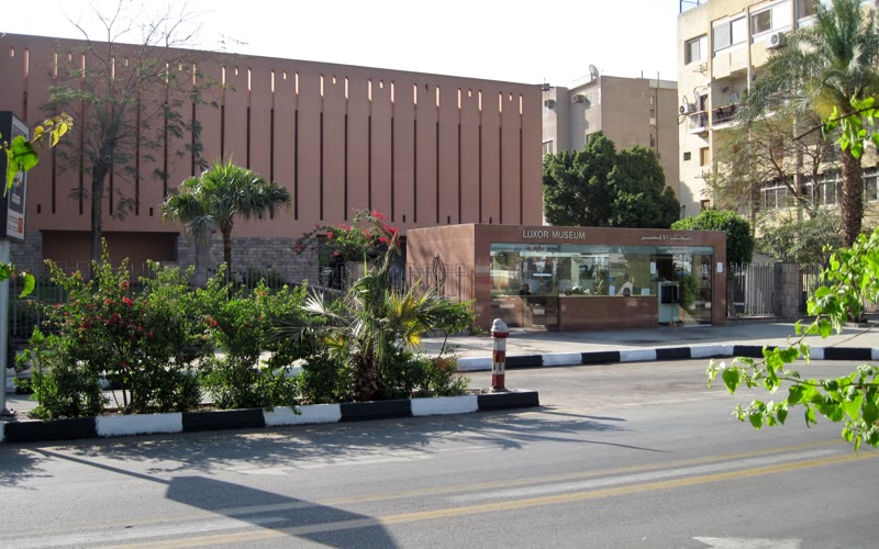 Low modernist entrance of Luxor Museum beside its landscaped forecourt