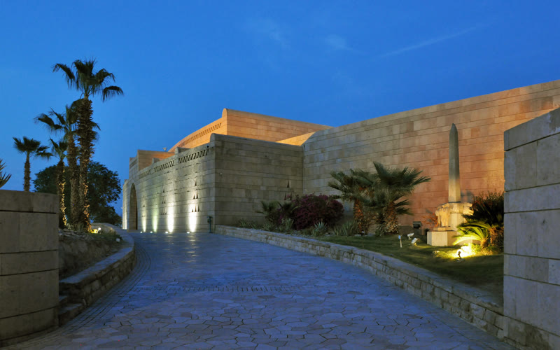 Sandstone entrance and landscaped grounds of the Nubia Museum in Aswan